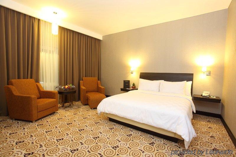 Swiss-Belhotel Kendari Habitación foto